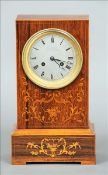 A 19th century French inlaid rosewood mantle clock The stepped square section case with scrolling