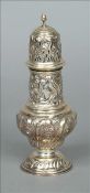 An Edward VII silver sugar caster, hallmarked Chester 1901, maker`s mark of GNRH The pierced