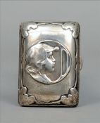 An Edward VII Art Nouveau silver cigarette case, hallmarked London 1901, maker`s mark of S & HW