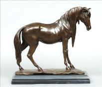 A 20th century bronze model of a racehorse Naturalistically modelled on all fours, standing on a