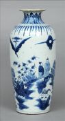 An 18th/19th century Chinese blue and white vase The squat flared neck with lappet decoration