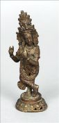 An Indian bronze model of Krishna Modelled standing, playing the flute. 14 cms high. Generally in