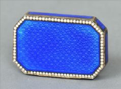 A 19th century Continental silver gilt and enamel snuff box Of canted rectangular form, the hinged