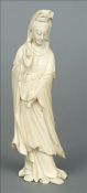 A late 19th/early 20th century Chinese carved ivory model of Guanyin Typically modelled and