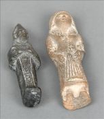 A pair of Egyptian Shabti figures Each pottery figure unglazed. The largest 16 cms high. (2) Some