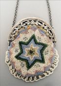 A 19th century Continental silver mounted beadwork purse The clasp with pierced floral decoration. 9