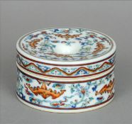 A Chinese Ducai porcelain box and cover Decorated overall with stylised bats within lotus strapwork,