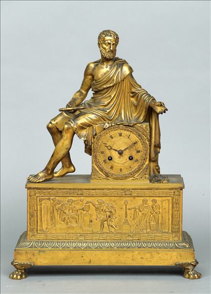 A 19th century ormolu mantle clock Surmounted with a classical figure holding a writing implement,