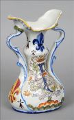 A Continental faience twin handled vase Decorated to each side with an initialled crest. 27 cms