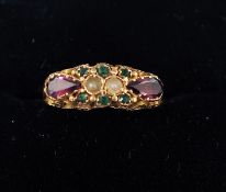 A 15 ct gold ring In the Suffragette colours, inset with two seed pearls flanked by amethyst and