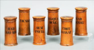 A set of 19th century treen apothecary jars Each of turned cylindrical form with removable lids