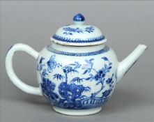 An 18th century Chinese blue and white porcelain teapot and cover Decorated with floral sprays