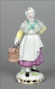 A 19th century Meissen porcelain figurine Formed as a maiden carrying a pail. 14.5 cms high. Crack