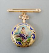 An enamel decorated 14 ct gold ladies fob watch The case decorated to the front with a young