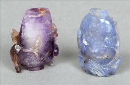 Two 19th century Chinese carved variegated stone snuff bottles Each of urn form with scrolling