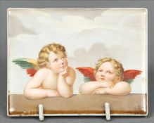 A 19th century porcelain plaque Painted with two curious cherubs, the reverse with blue crossed