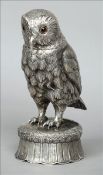 An unmarked Continental silver model of an owl Formed standing on a naturalistically modelled plinth