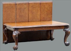 A Victorian pollard oak extending dining table The moulded rounded rectangular top incorporating