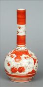 A Japanese Kutani porcelain bottle vase With tall slender neck and typically decorated. 24 cms high.