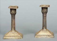 A pair of small Victorian silver candlesticks, hallmarked Sheffield 1889, maker`s mark of JR Each of