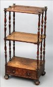 A Regency simulated rosewood caned whatnot The finial mounted caned rectangular top tier supported