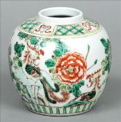 A Chinese porcelain vase Of bulbous form, decorated with exotic birds within floral sprays, blue