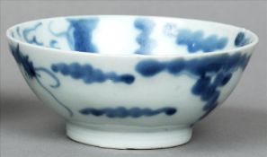 A Chinese blue and white porcelain dragon bowl Decorated with stylised dragons within stylised