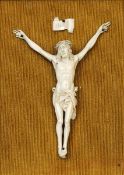 A 19th century carved ivory Corpus Christi Typically formed. 18 cms high. Some slight fritting,
