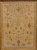 A 19th century needlepoint sampler by Elizabeth Drews and dated 18** Worked with a verse within