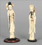A pair of Chinese carved ivory figures One formed as a bearded man with a sword on his back, the