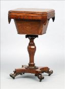 A William IV rosewood work table The hinged canted rectangular top enclosing a fitted interior