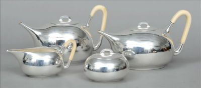 An Art Deo Continental silver four piece tea set Each piece of elongated bullet form, the teapot,