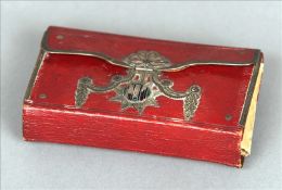 A 19th century enamel and white metal mounted red Morocco necessaire The folding case enclosing