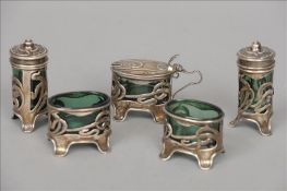 An Edwardian Art Nouveau five piece silver cruet set, hallmarked Birmingham 1905, maker`s mark of