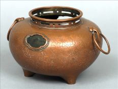A late 19th/early 20th century Chinese copper censor The pierced neck above the twin pierced bulbous