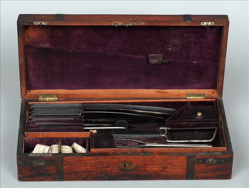 A 19th century brass bound rosewood cased surgeons set The plush lined box housing two layers of