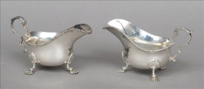 A pair of George V silver sauce boats, hallmarked London 1935, maker`s mark of RWB, retailed by