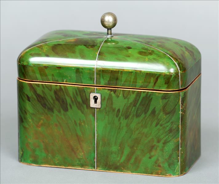 A George III green stained tortoiseshell tea caddy The domed hinged cover with ball finial enclosing