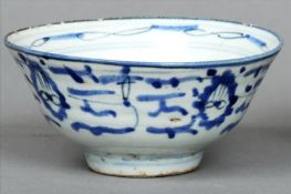 An Eastern blue and white porcelain bowl Decorated with stylised clouds, blue painted mark to