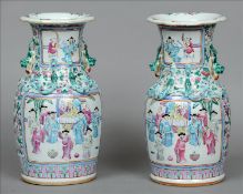 A pair of 19th century Cantonese vases Each shaped rim above dog-of-fo handles and further applied