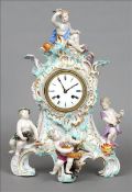 A 19th century Continental porcelain cased mantle clock, possibly Meissen The gilt heightened
