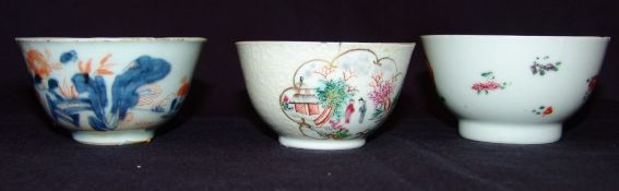 A Chinese Export porcelain tea bowl Typically decorated with floral sprays; together with another,