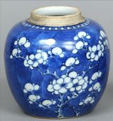 A Chinese blue and white porcelain ginger jar Typically decorated with blossom sprays, blue