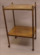A 19th century brass mounted mahogany two tier etagere The crossbanded quarter veneered