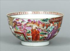 A Chinese Canton porcelain bowl Decorated with figures in traditional costume in a riverside