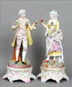 A pair of 19th century Continental porcelain figures on stands, possibly Meissen Each dressed in