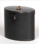 A George III papier mache tea caddy, possibly by Henry Clay Of oval form with painted trailing