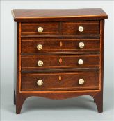 A 19th century mahogany apprentice piece miniature chest of drawers The line inlaid rectangular