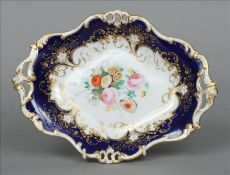 A Victorian Davenport porcelain comport Decorated with flowers amongst gilt scrolling; together with