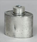 A Liberty & Co. pewter tea caddy Of lozenge form, the cover inset with a turquoise cabochon, stamp